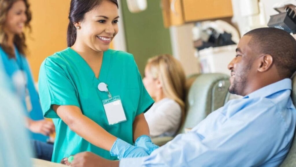 a nurse takes blood for biochemical analysis