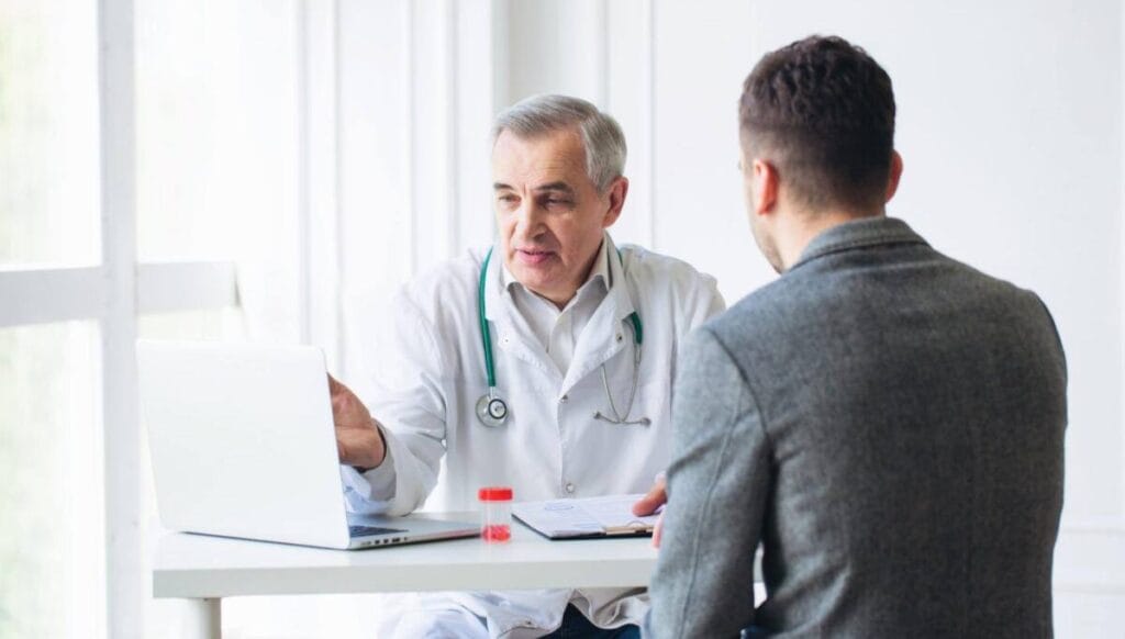 doctor consults patient based on genetic analysis results