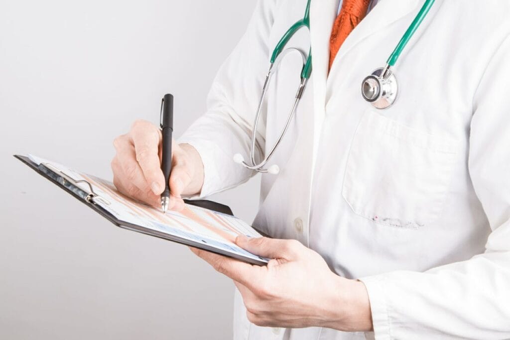 Doctor analyzing tumor marker results in clinical laboratory